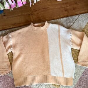 Elegant Peach and Cream Sweater